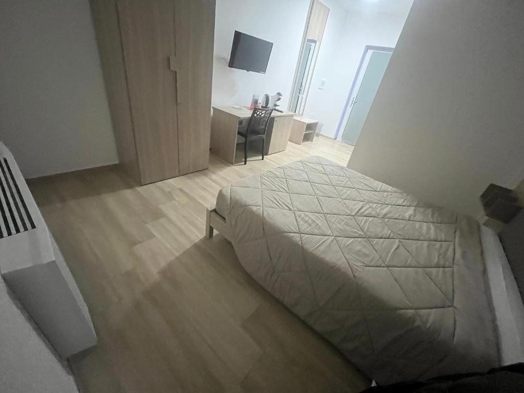 Postel nebo postele na pokoji v ubytování B&B La Terrazza Polifrone