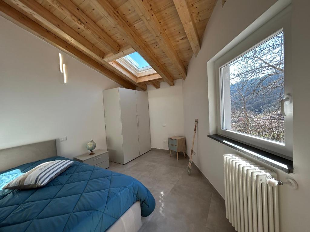 Postel nebo postele na pokoji v ubytování El Fossadeu-Biassa-Cinque Terre