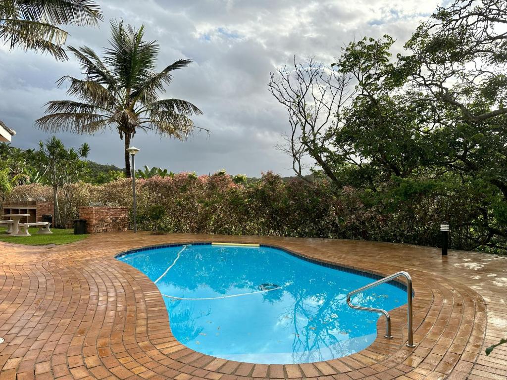 Bazén v ubytování Lovely 3 bedroom holiday home with ocean view nebo v jeho okolí