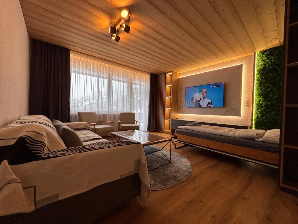 Posezení v ubytování Luxuse Ferienwohnung Flüe 11