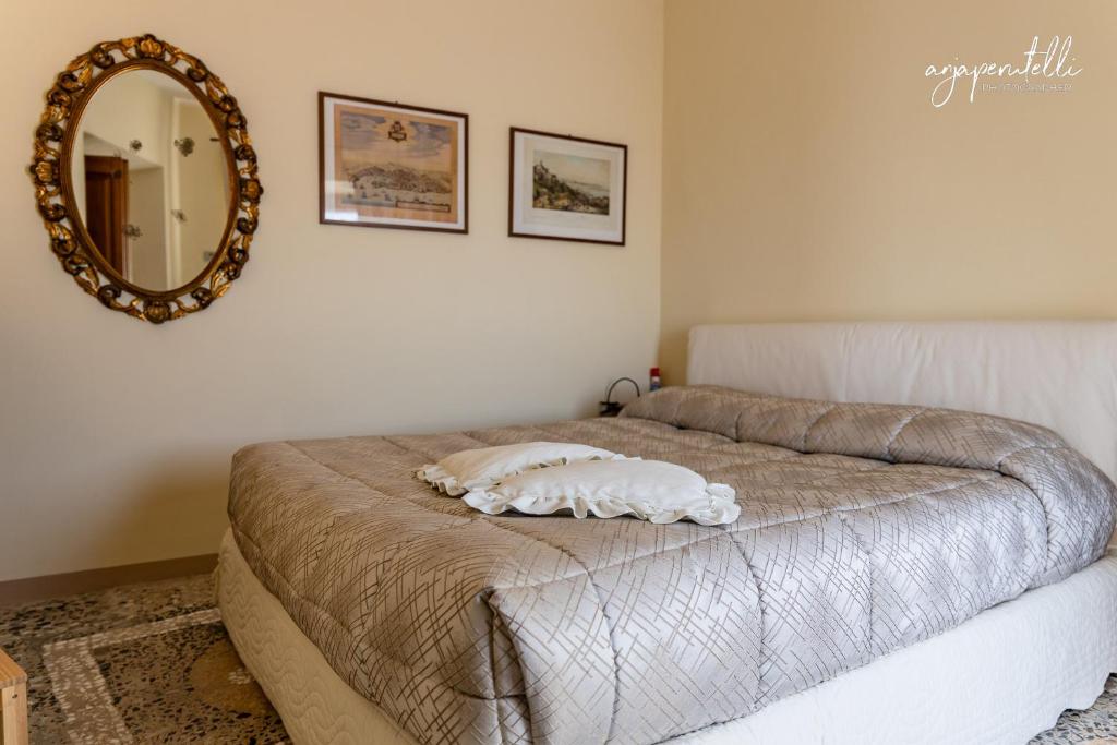 Letto o letti in una camera di La Terrazza di Tranci