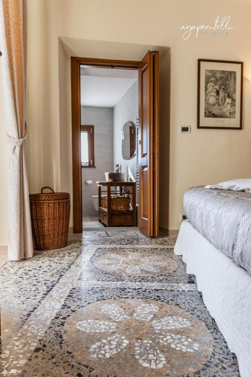 Letto o letti in una camera di La Terrazza di Tranci