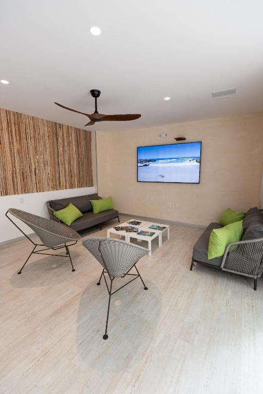 TV a/nebo společenská místnost v ubytování SUUT Hostal Boutique