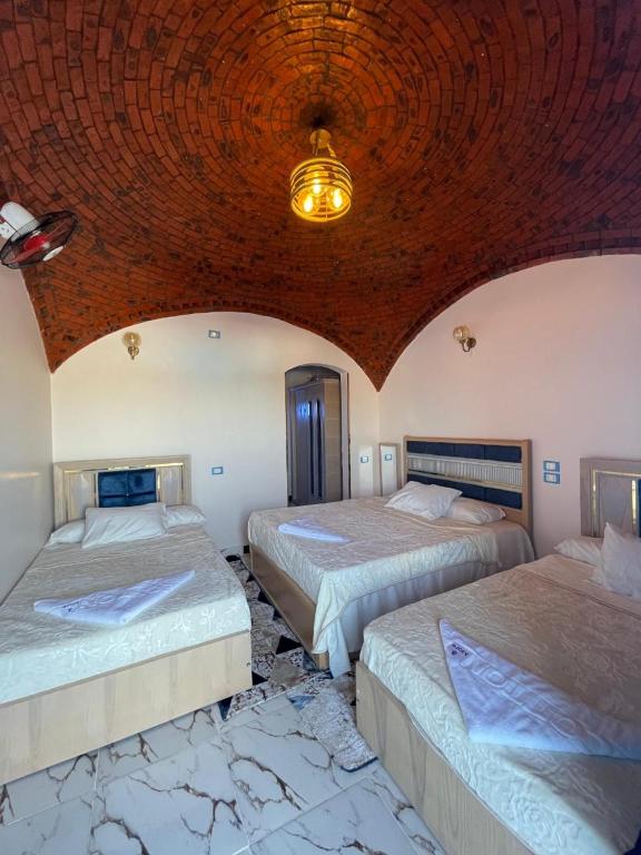 Postel nebo postele na pokoji v ubytování Papy house