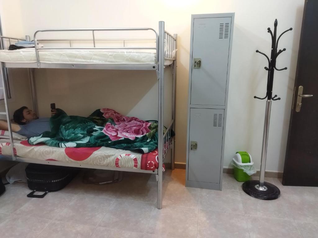 Postel nebo postele na pokoji v ubytování Cozy Vibes Hostel