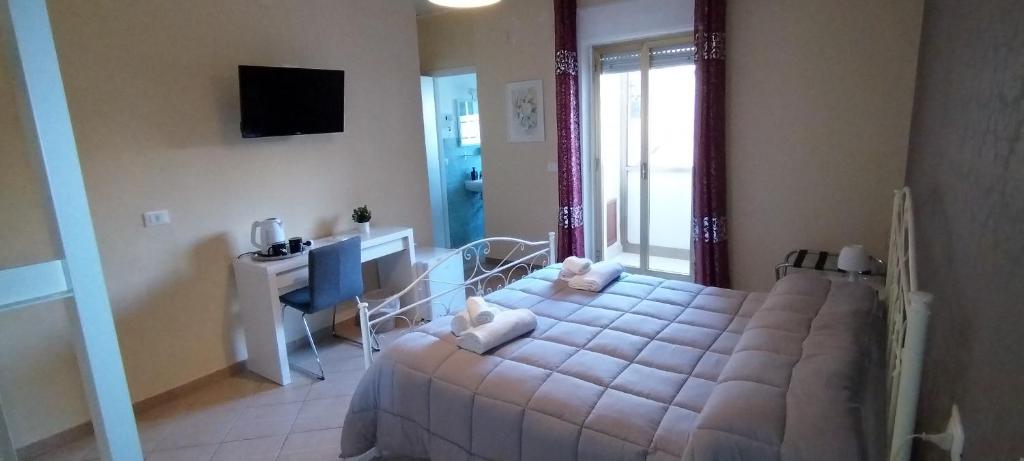 TV a/nebo společenská místnost v ubytování SUITE PRINCIPE SCORDIA