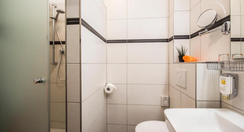 Koupelna v ubytování GS Hotel