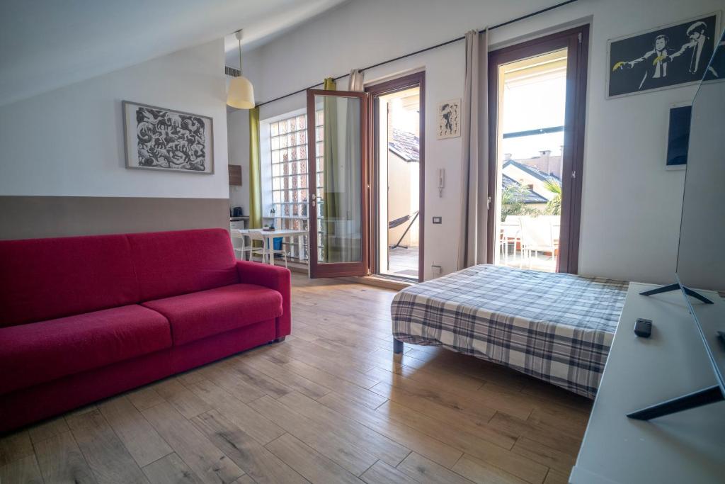 Posezení v ubytování Flat with terrace close to Forum and Milanofiori Metro