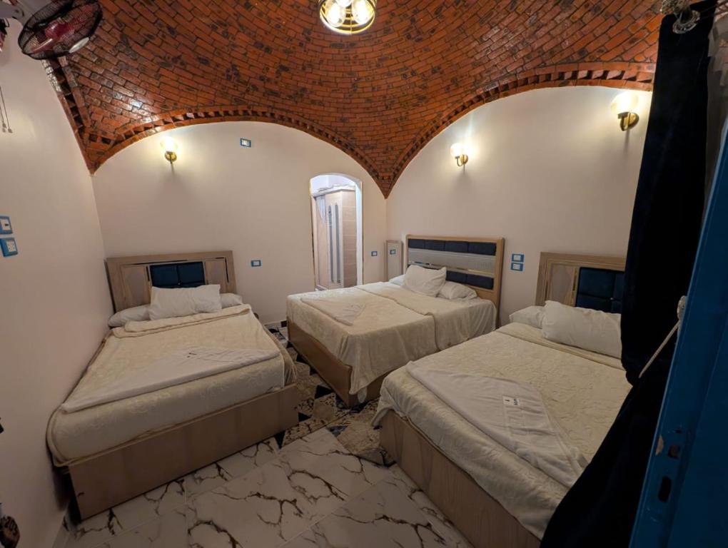 Postel nebo postele na pokoji v ubytování Papy house