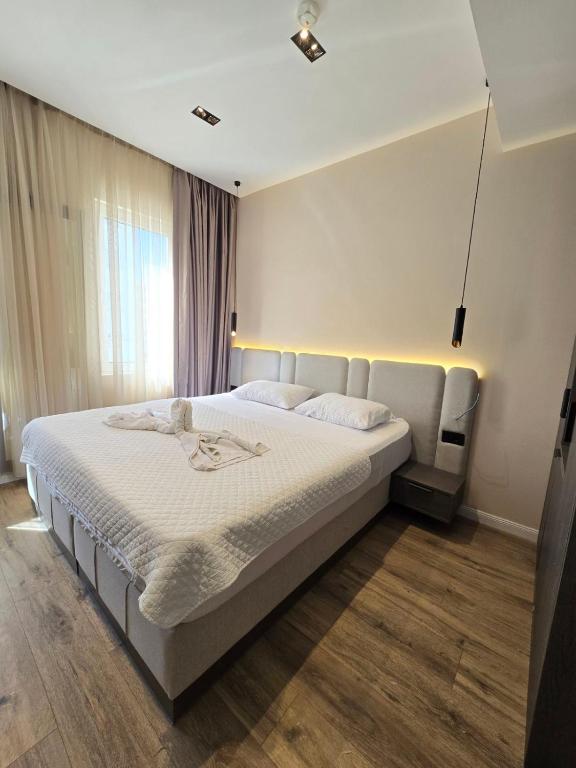 Voodi või voodid majutusasutuse Hotel Umma toas