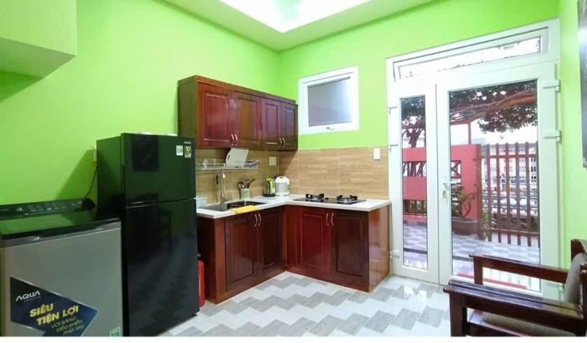 Kuchyň nebo kuchyňský kout v ubytování Vinh Phong APT # 1