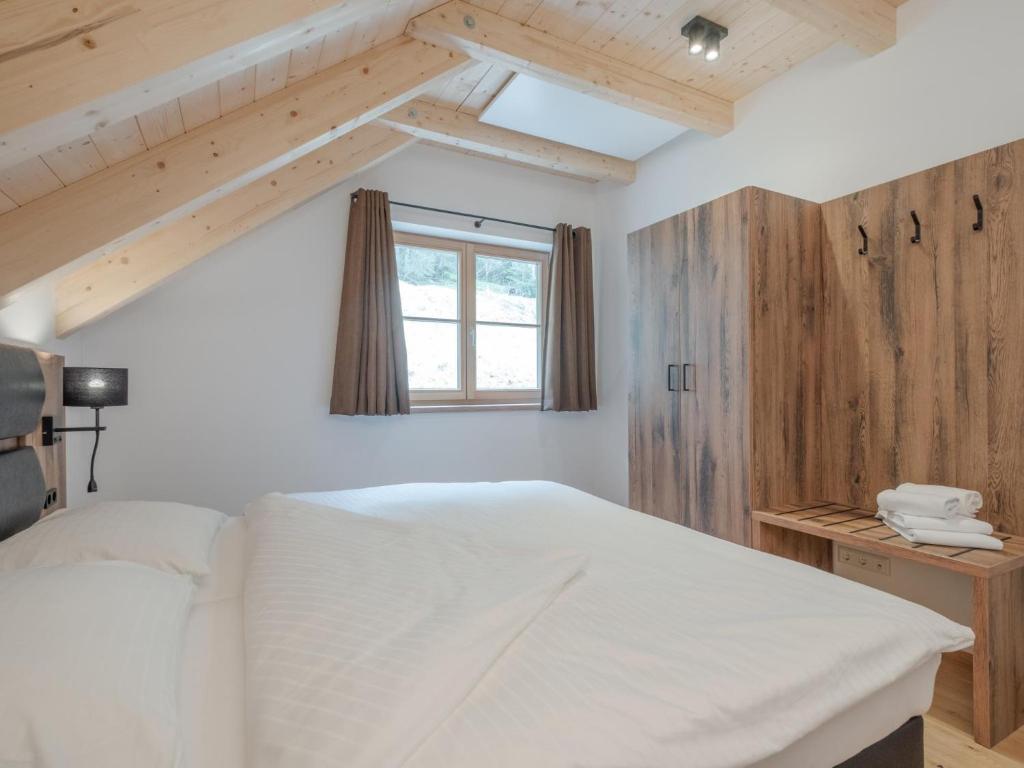 Postel nebo postele na pokoji v ubytování Haus am Wald