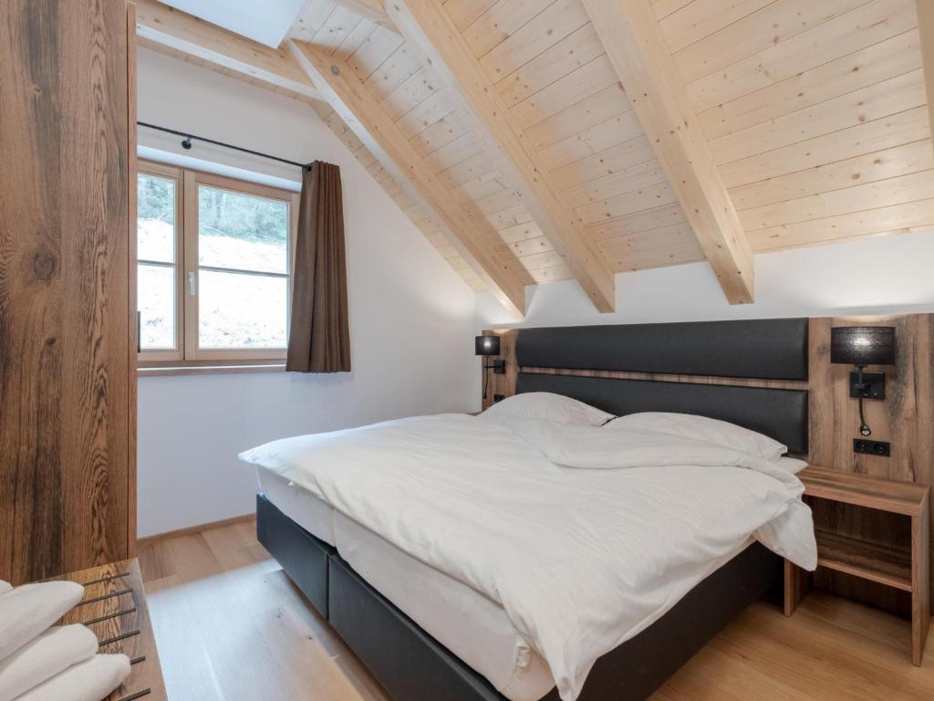 Postel nebo postele na pokoji v ubytování Haus am Wald
