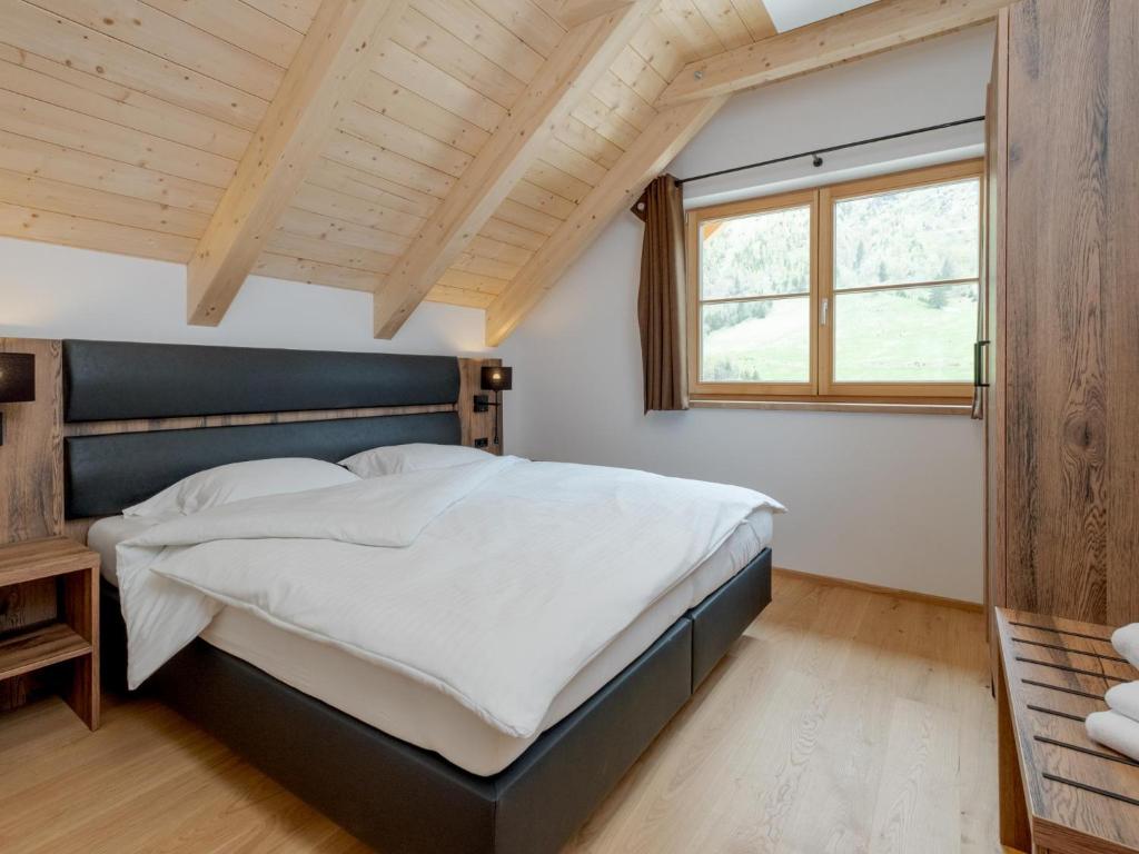 Postel nebo postele na pokoji v ubytování Haus am Wald