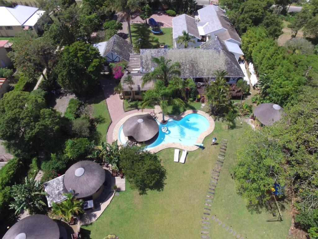 an aerial view of a house with a swimming pool at Fish Eagle Manor in East London
