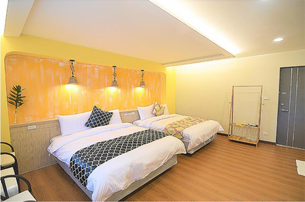 Postel nebo postele na pokoji v ubytování No. 21 Jiaoxi Hot Spring Homestay