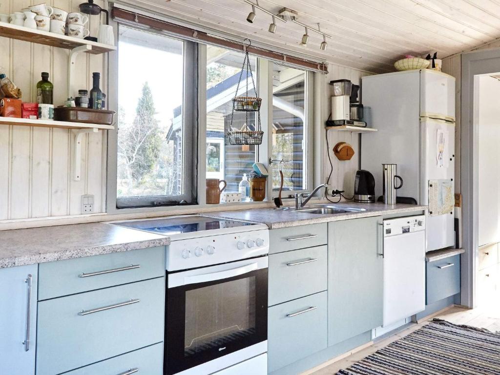Kuchyň nebo kuchyňský kout v ubytování Cozy Retreat in Ellinge Lyng - By Traum Ferienwohnungen