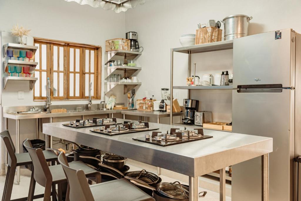 Kuchyň nebo kuchyňský kout v ubytování Kualena Hostal