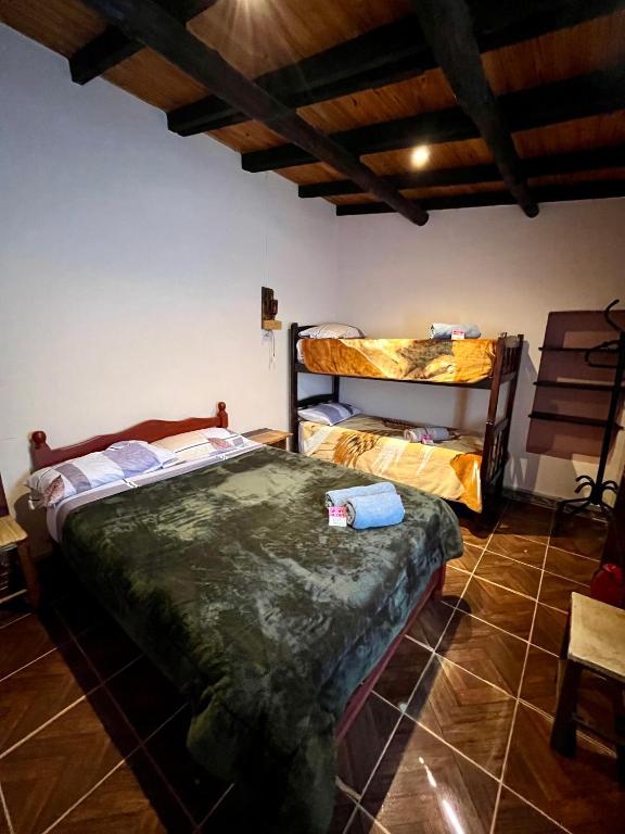 a bedroom with two bunk beds in a room at Faustina in Purmamarca