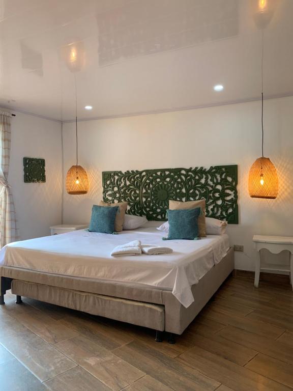 Postel nebo postele na pokoji v ubytování Hotel el Ancla Campestre