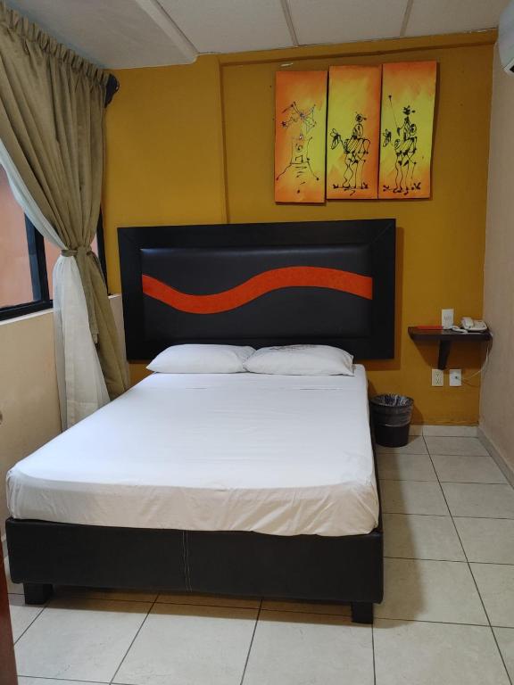 Postel nebo postele na pokoji v ubytování Hotel Tradicional Savaro SA de CV