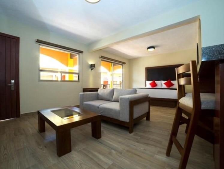 Postel nebo postele na pokoji v ubytování Hotel Colonial Acopinalco Inn