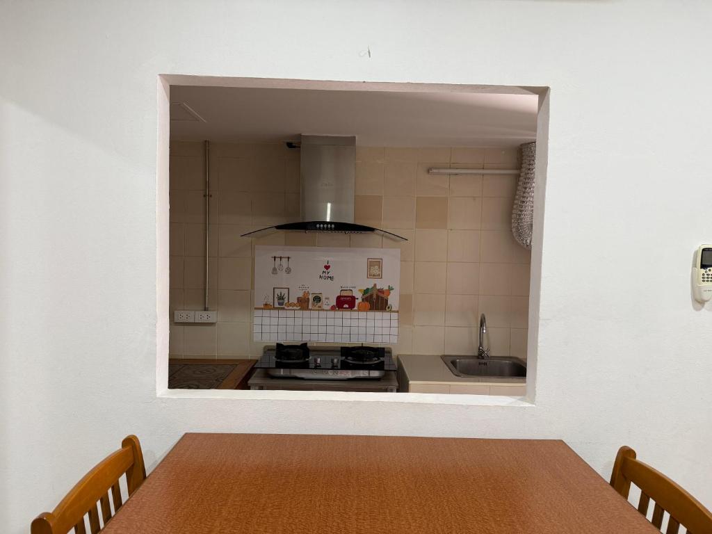 Kuchyň nebo kuchyňský kout v ubytování Hua Lin Inn