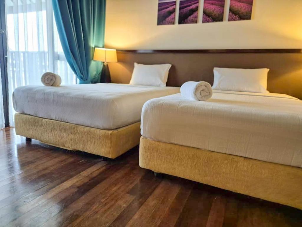 Postel nebo postele na pokoji v ubytování Ark Goldcoast Resort
