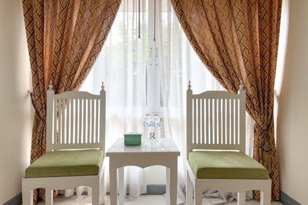 Posezení v ubytování Rasa Boutique Hotel Chiang Rai