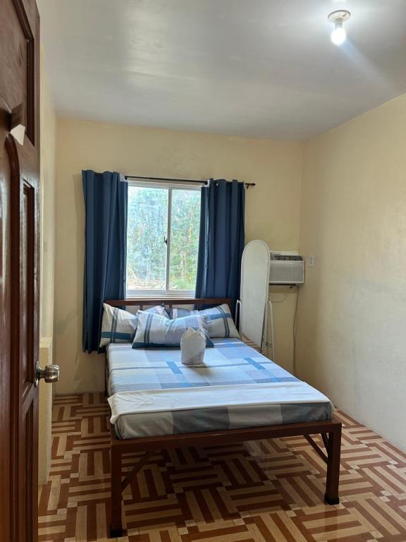 Postel nebo postele na pokoji v ubytování Carillo guest house