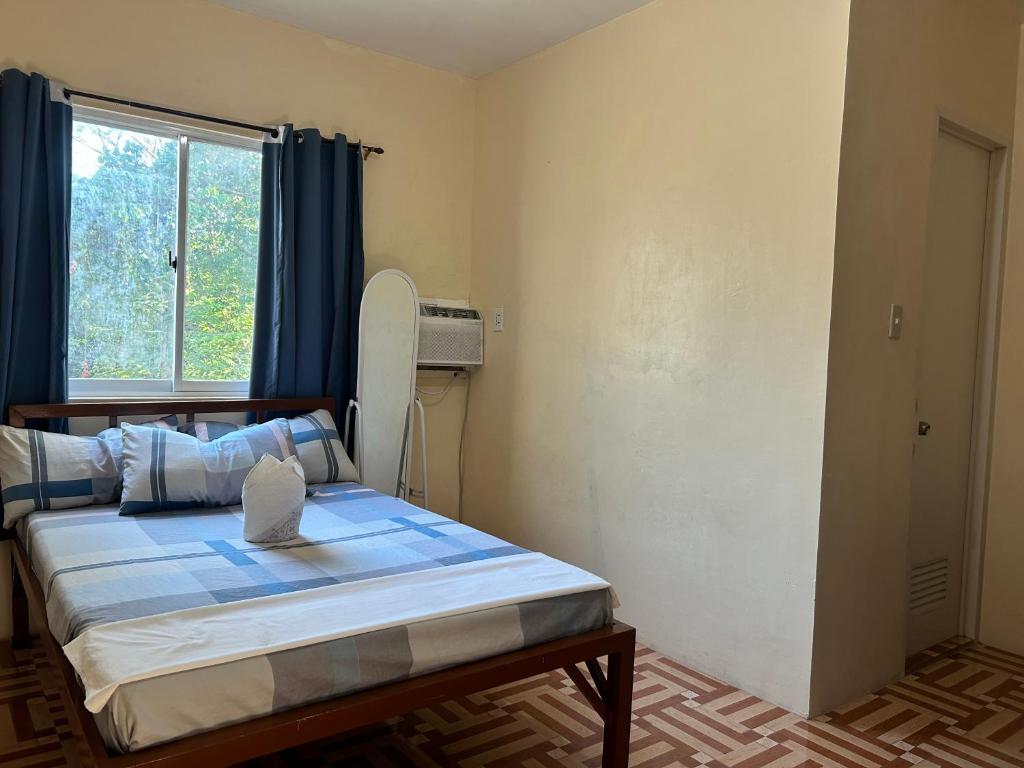 Postel nebo postele na pokoji v ubytování Carillo guest house