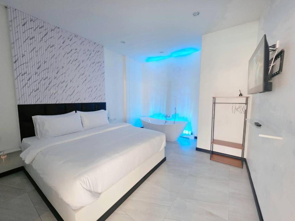 Postel nebo postele na pokoji v ubytování Niyham Pool Villa