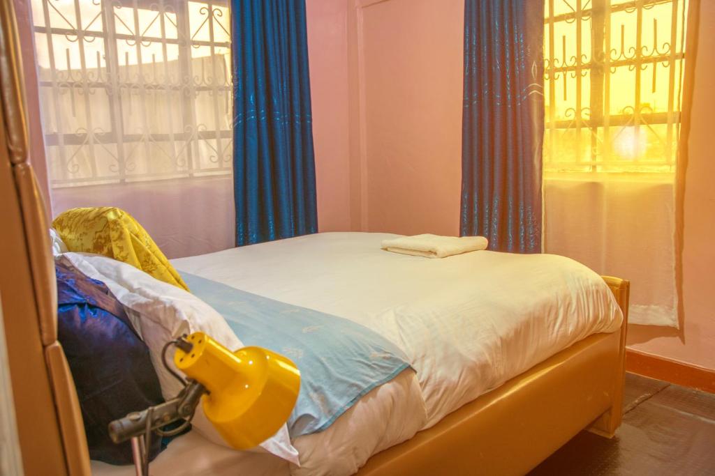 Postel nebo postele na pokoji v ubytování point escape