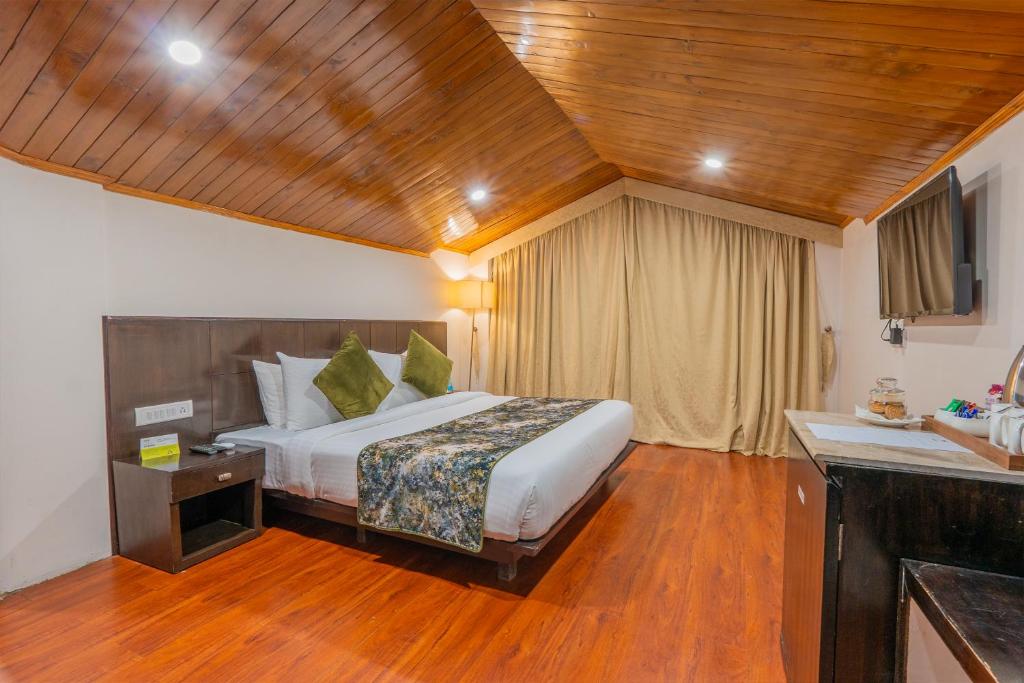 Postel nebo postele na pokoji v ubytování Woodrock Luxury Boutique Hotel
