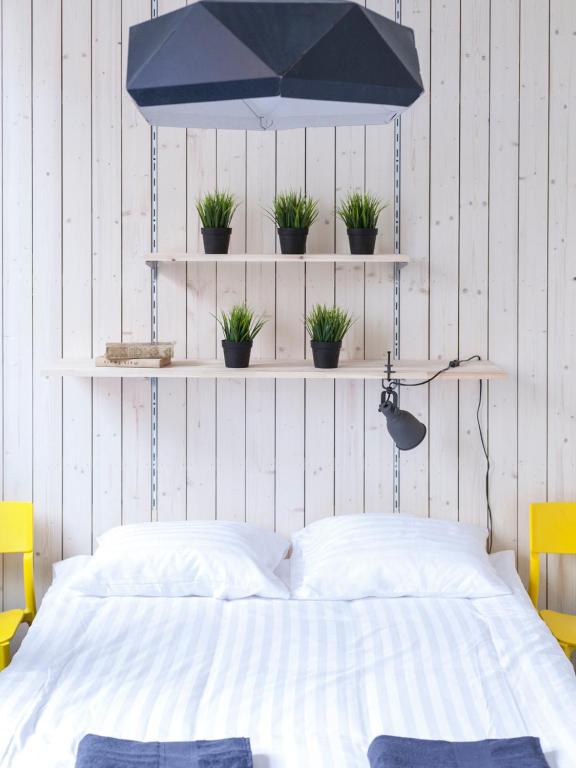 Voodi või voodid majutusasutuse Hektor Design Hostel toas
