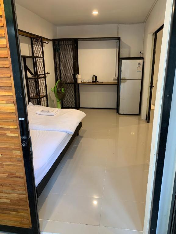 Postel nebo postele na pokoji v ubytování Amazing Inn Koh Tao