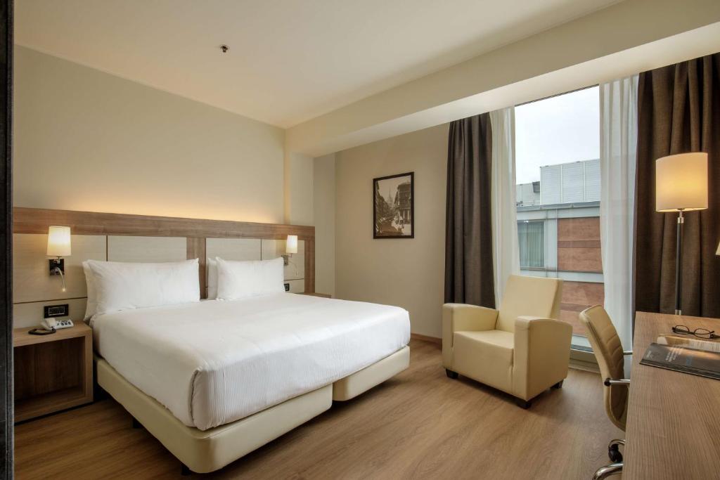 Postel nebo postele na pokoji v ubytování DoubleTree By Hilton Milan