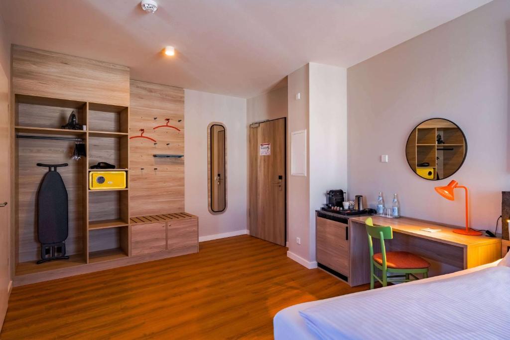Letto o letti in una camera di Ramada Encore by Wyndham Munich Messe