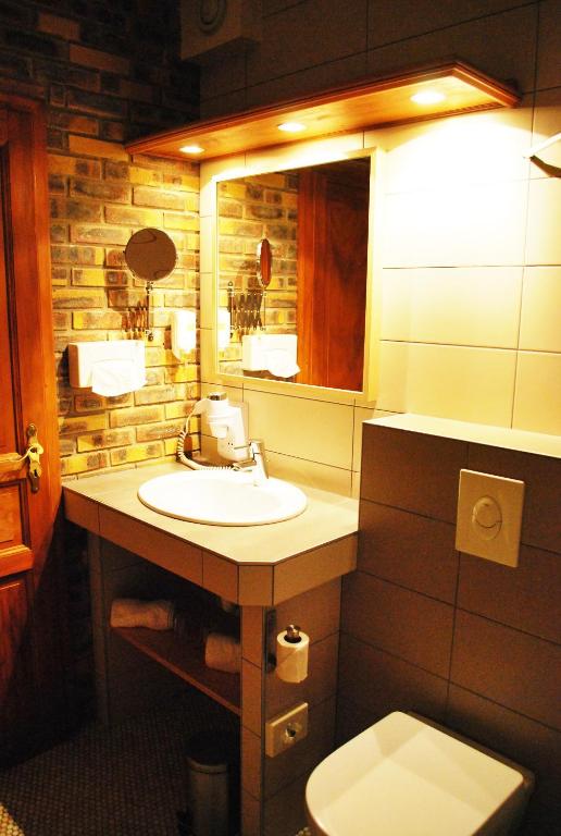 Koupelna v ubytování Logis Hôtel Restaurant Kleiber