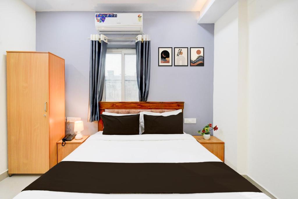 Postel nebo postele na pokoji v ubytování Super Townhouse Lanco Hills Gachibowli
