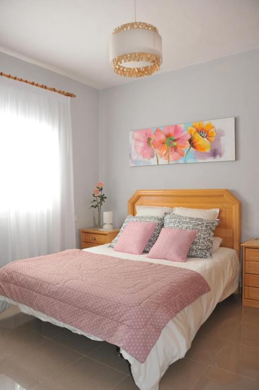 Posteľ alebo postele v izbe v ubytovaní Vivienda Vacacional Paseo Mirabal