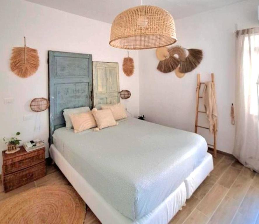 Giường trong phòng chung tại Residenza Vittoria Livorno