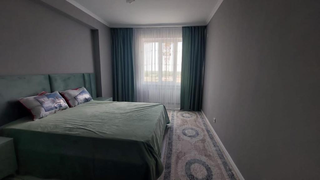 Una cama o camas en una habitación de Ошибка