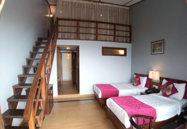 Postel nebo postele na pokoji v ubytování Green N Breeze Resorts Mussoorie