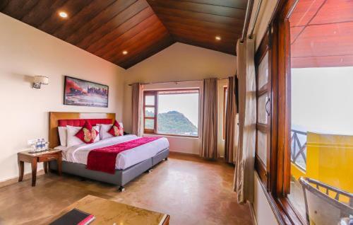 Postel nebo postele na pokoji v ubytování Green N Breeze Resorts Mussoorie