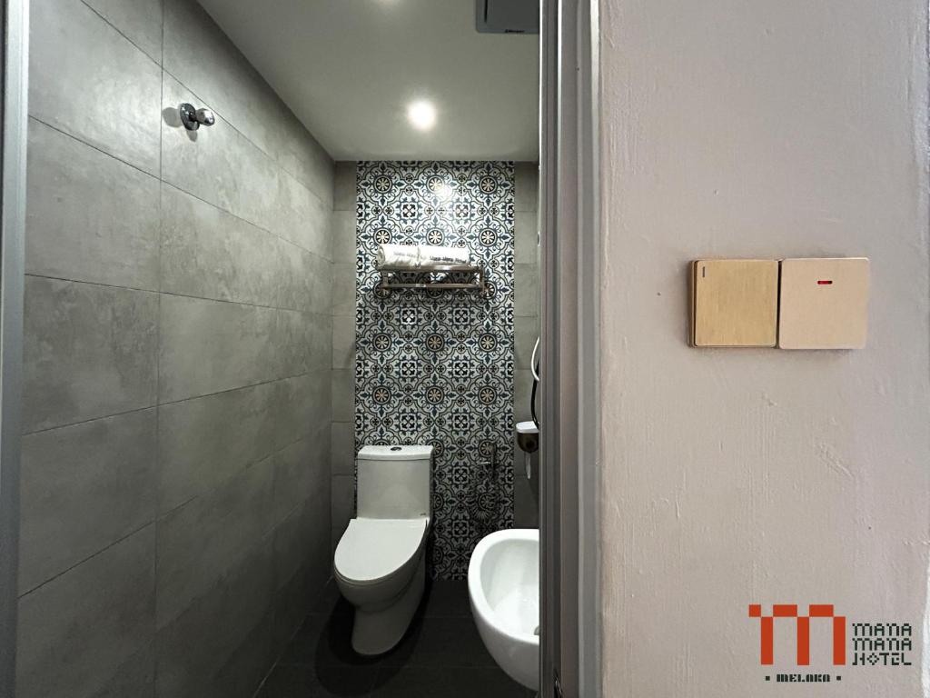 Koupelna v ubytování Mana Mana Hotel • Melaka •