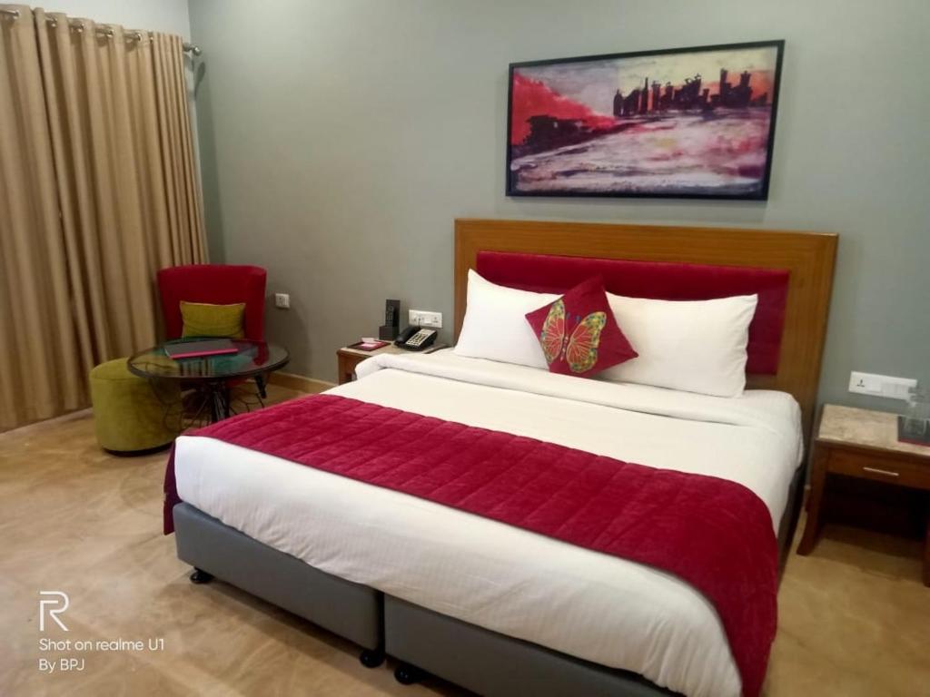 Postel nebo postele na pokoji v ubytování Green N Breeze Resorts Mussoorie