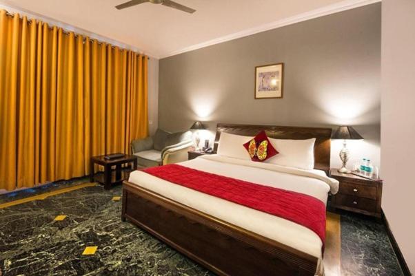 Postel nebo postele na pokoji v ubytování Green N Breeze Resorts Mussoorie