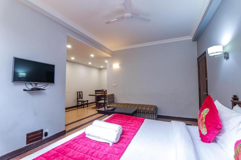 Postel nebo postele na pokoji v ubytování Green N Breeze Resorts Mussoorie