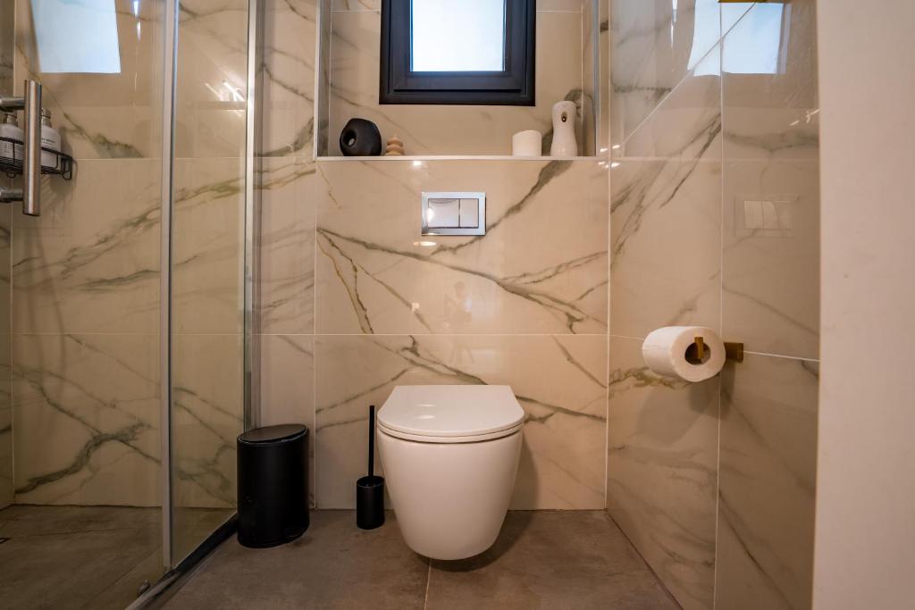Ein Badezimmer in der Unterkunft Sun City - By Harim